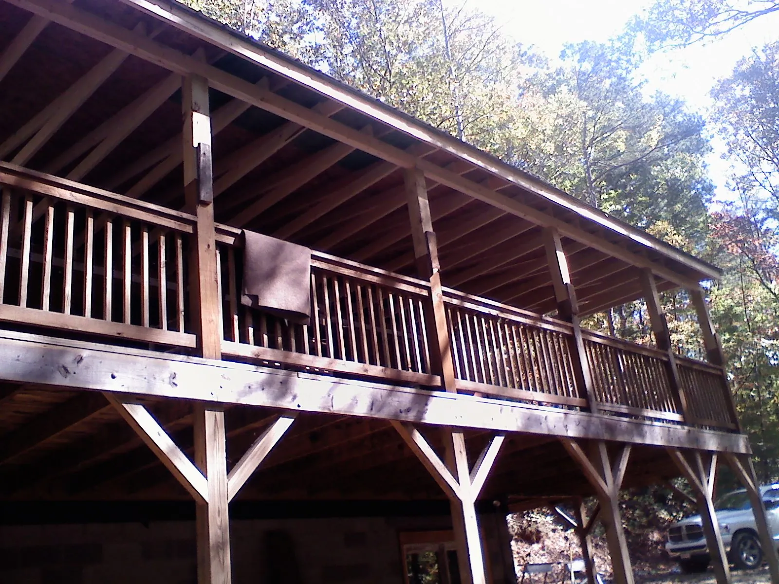 Timber framing under a new elevated porch and deck — Roof Leak Repair in Ravensdale by Roofing Brothers